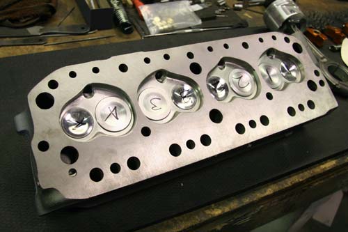 Flowed and ported cylinder head for supercharged MGB engine