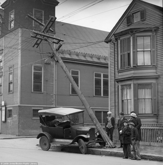 This car remarkably survived a collision with a utility pole in Cambridge, Mass - with just a mangled bumper to show for the crash