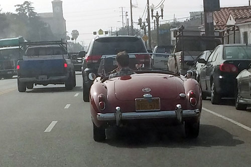In heavy Hollywood traffic, a nice MGA.