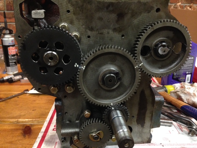 To set the timing you align all the punch marks on the gears.  This sets the fuel cam and a valve cam.