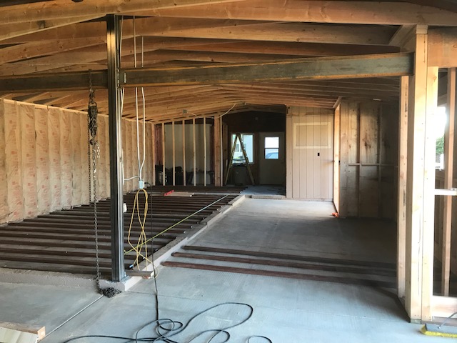 Floor joists going in to level the space