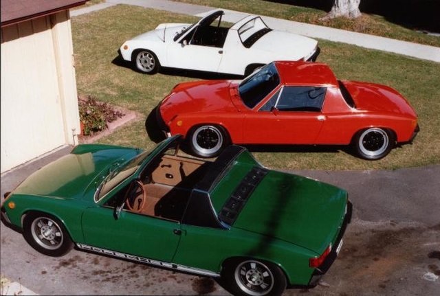 MHKs 914's in Front Yard in 1994 The White 914-4 is a 69 1_7L The Signal Orange 914-6 is a  70 and the Zambezi Green 914-4 2_0L is 73 SM.jpg